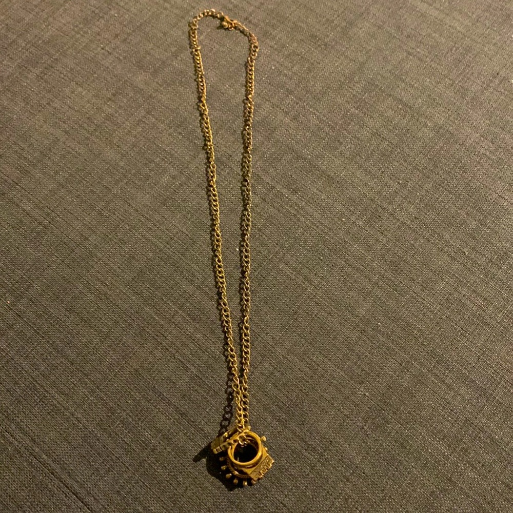 Bohemian style necklace with various dangling charms